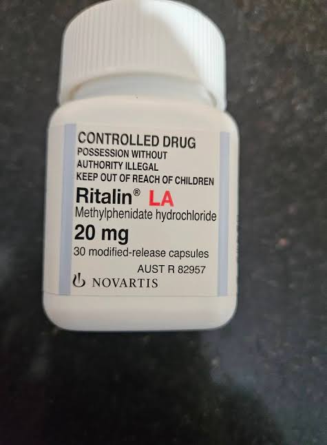 Ritalin 10 mg, 20 mg, and 5 mg pills in a prescription bottle